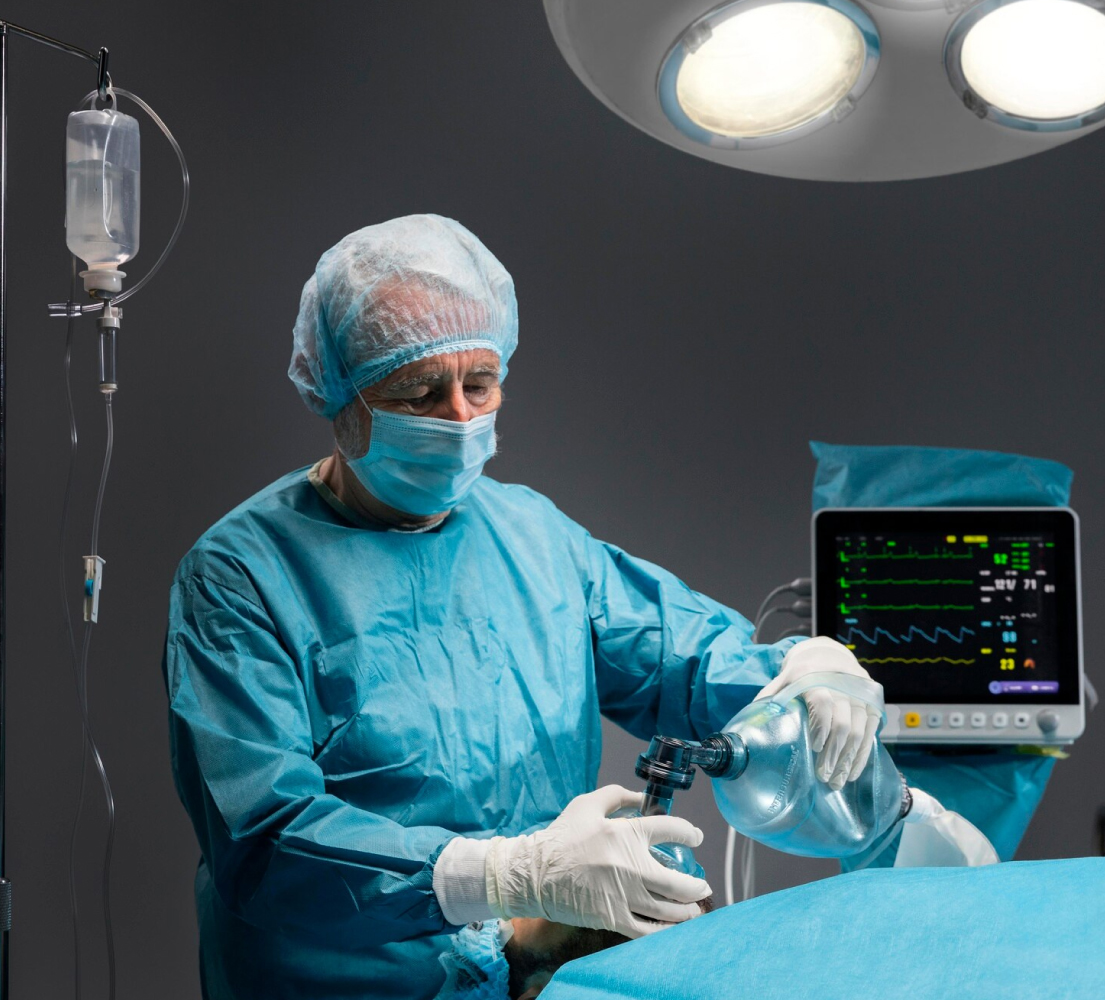 Anesthesiologist using monitoring tools in OR with support from AI Scribe for Anesthesiologists.